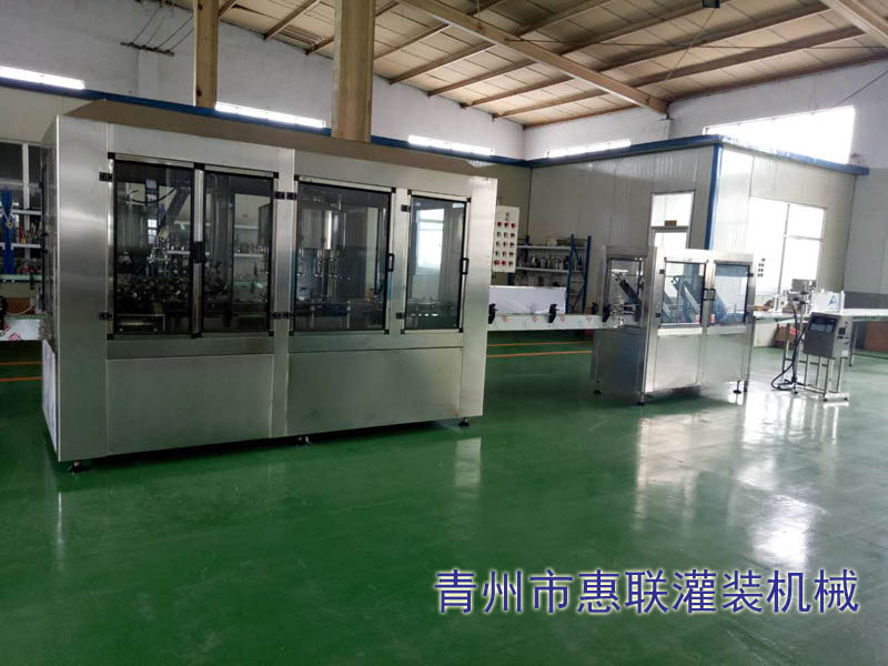 洗瓶灌裝壓蓋三合一葡萄酒灌裝機(jī)